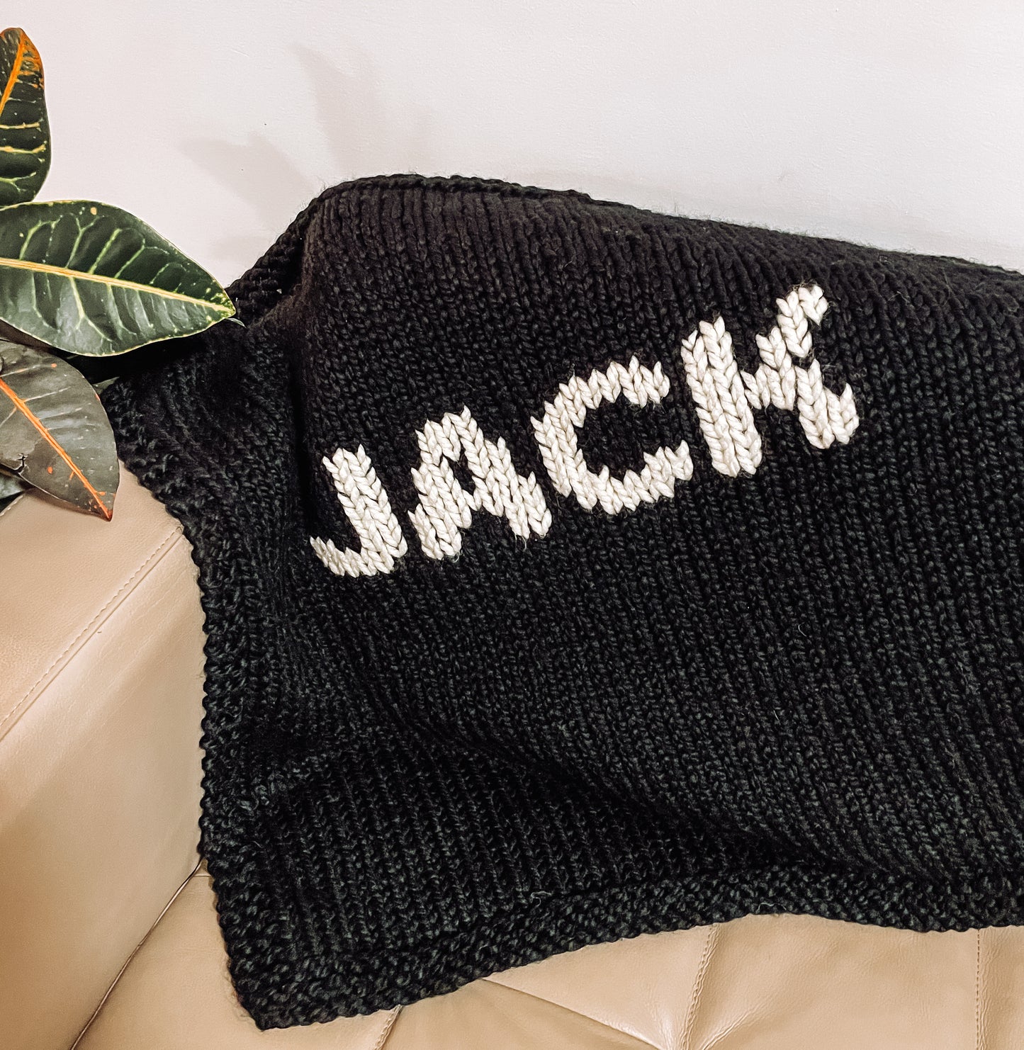 Black Blanket with Cream Lettering