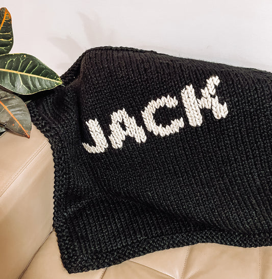 Black Blanket with Cream Lettering